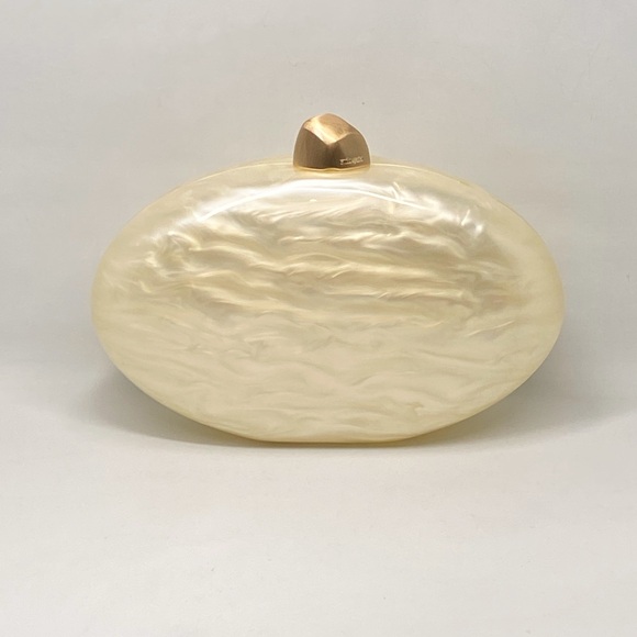 cult gaia Handbags - Cult Gaia Eviana Pearlized Clutch